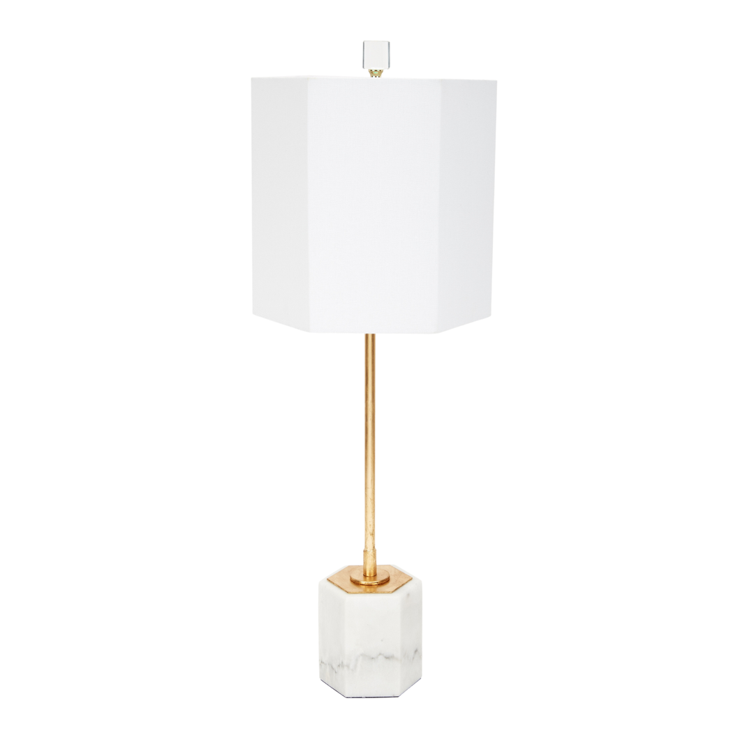 Modern table lamp with white square shade, gold stem, and marble hexagon base on white background