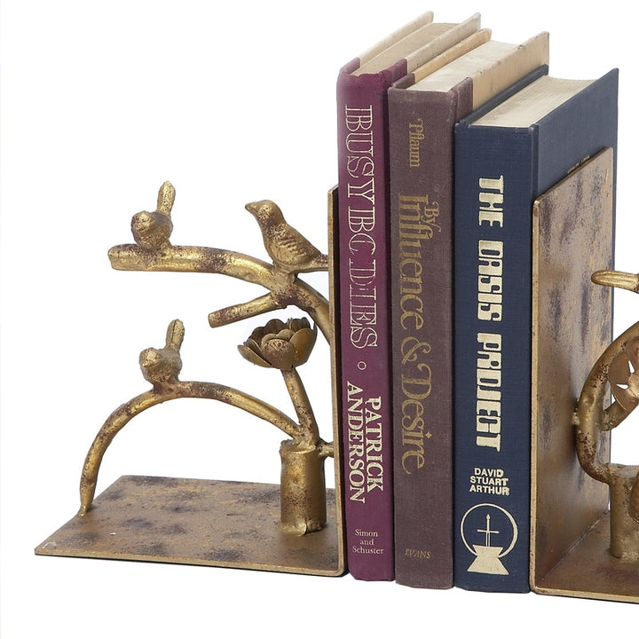 Antique gold bird bookend set of 2 with arched branch and side perch.