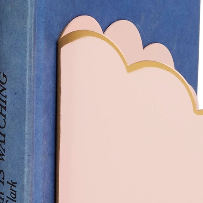 Blush cloud-shaped bookend with scalloped edge and gold trim