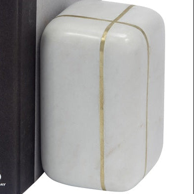 White marble bookend with brass inlay border, rounded rectangle shape