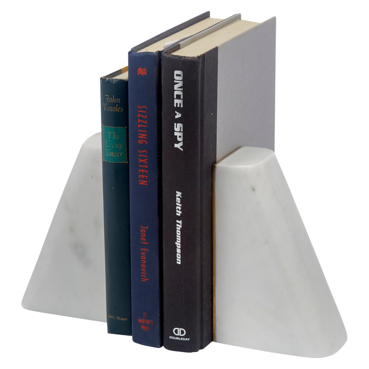 White marble angled bookends with brass inlay holding books