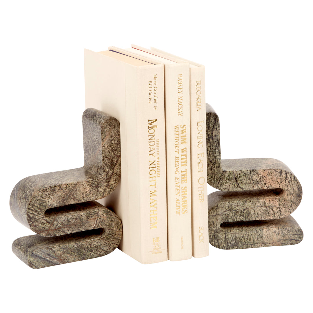 Curved stone-look bookends holding a row of books, side clamp style