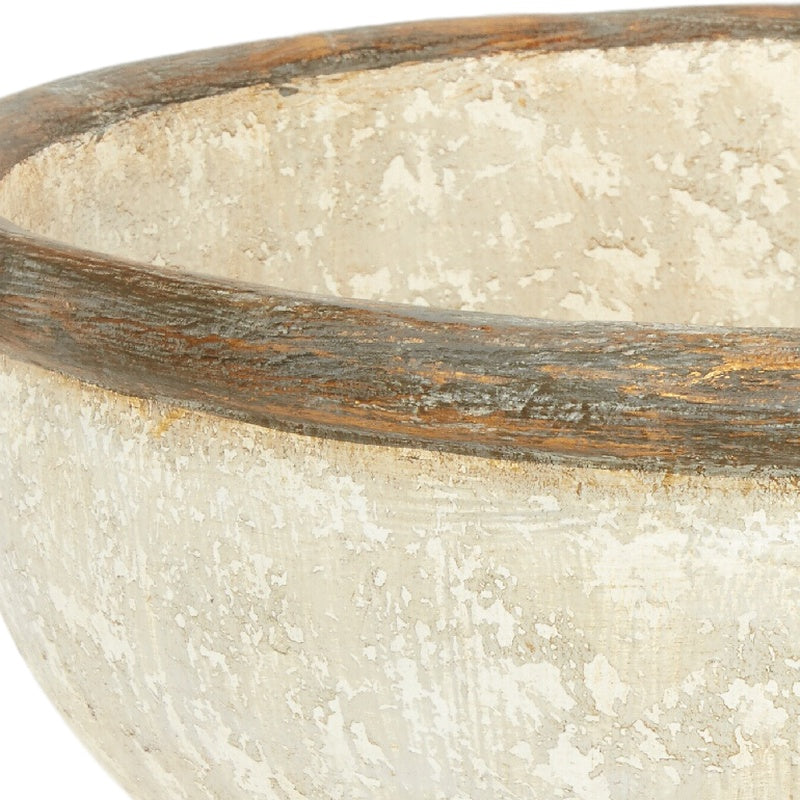 White ceramic bowl with distressed beige finish and wide curved rim