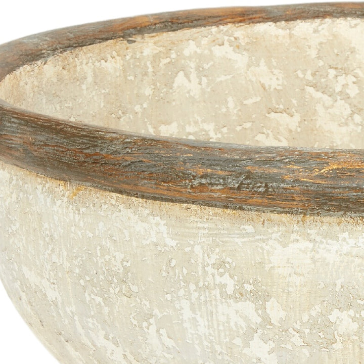 White ceramic bowl with distressed beige finish and wide curved rim