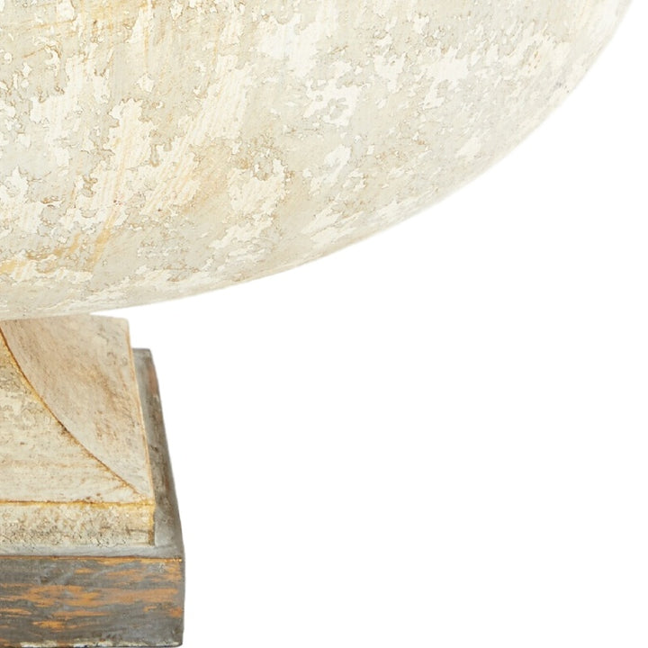 Distressed white ceramic bowl with antique gold banding at the base