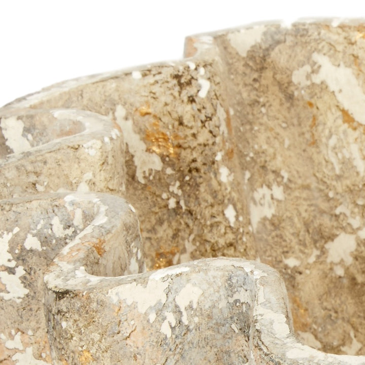 Distressed decorative bowl with gold and grey speckled texture, carved rim