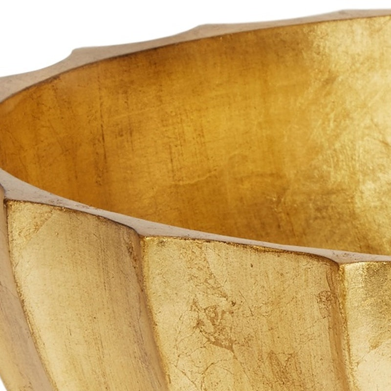 Gold leaf decorative bowl close-up of textured side panels and raised rim