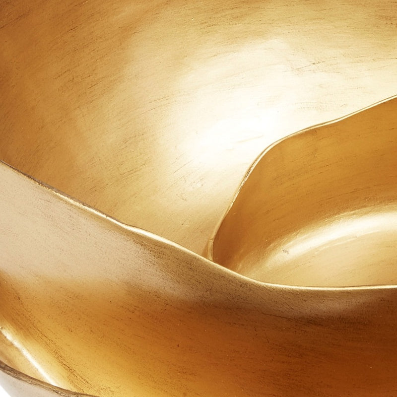 Decorative gold leaf swirl bowl interior with curved rim, glossy metallic finish