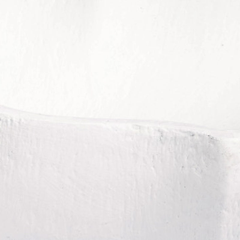White gesso bowl close-up of textured sidewall and raised rim edge
