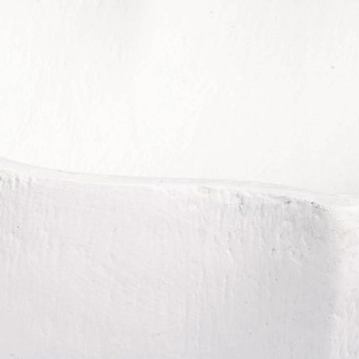 White gesso bowl close-up of textured sidewall and raised rim edge