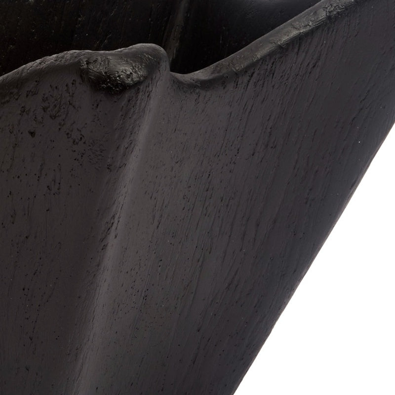 Black decorative bowl rim close-up, wavy sculpted edge and textured gesso finish