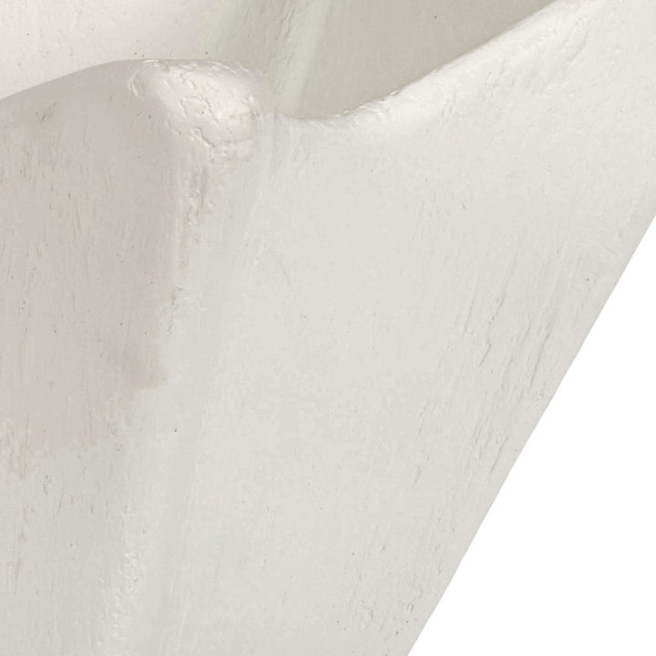 White gesso decorative bowl close-up of textured surface and curved rim