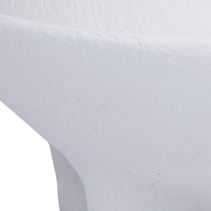 White gesso bowl close-up showing textured surface and curved side