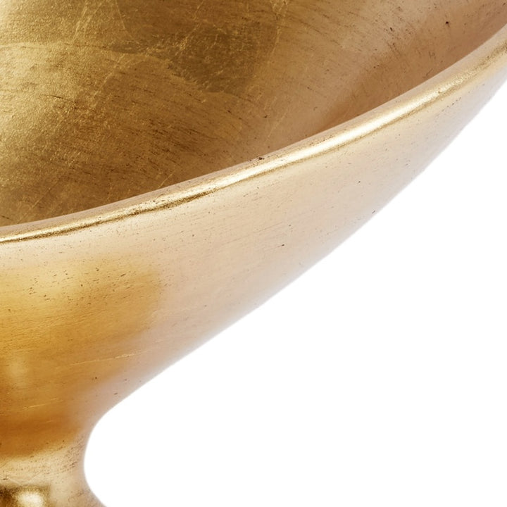 Oval gold leaf bowl showing inner curve and thin gold edge