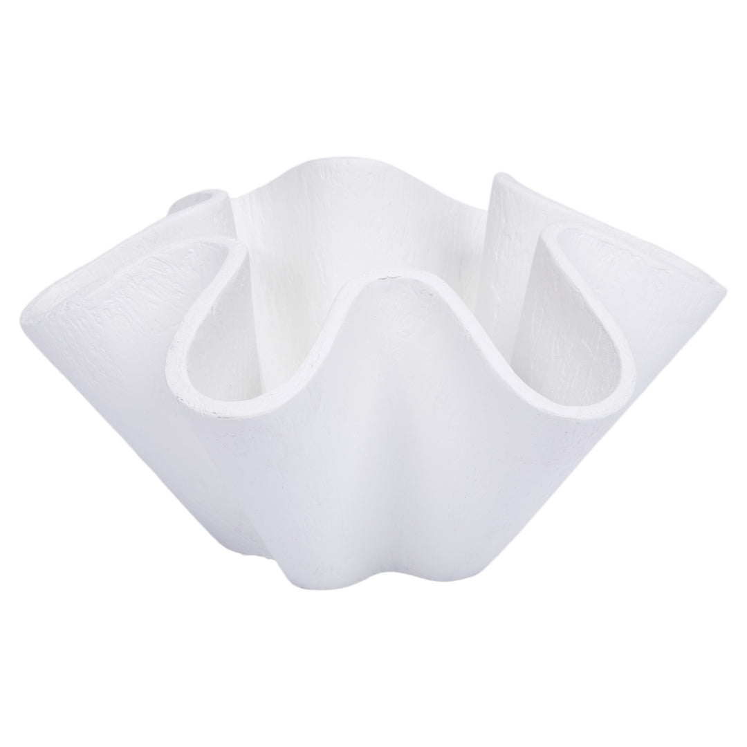White wave-shaped decorative bowl with curved cutout ridges