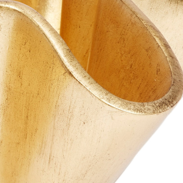 Close-up of gold wave bowl rim and inner curve with brushed leaf finish