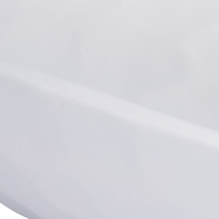 Close-up of white gesso decorative bowl surface, smooth matte texture