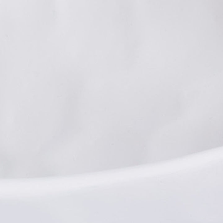 Close-up of white gesso decorative bowl rim curve with subtle matte finish
