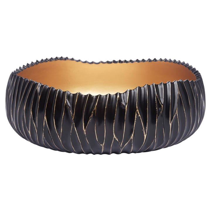 Dana black decorative bowl featuring gold accents, perfect for modern coffee tables, sideboards, or home displays.