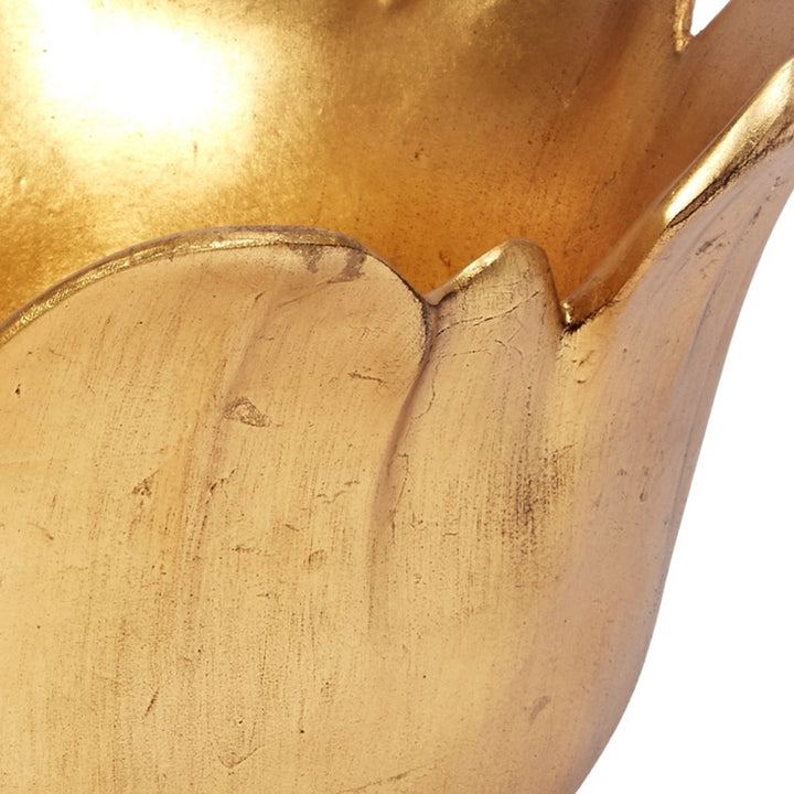 Gold leaf decorative bowl interior with scalloped rim and worn texture detail