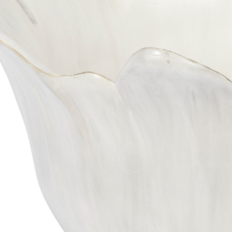 Close-up of cream decorative bowl showing washed texture and thin gold rim detailing