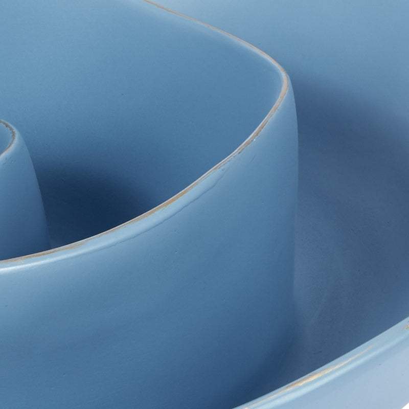 Small blue decorative bowl with curved sidewall and glossy rim trim