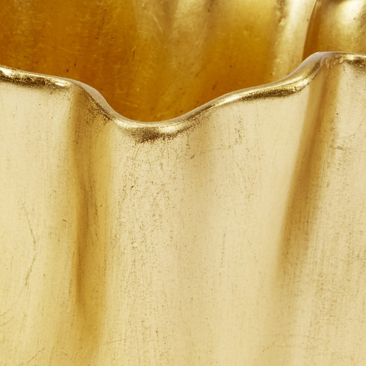 Gold leaf bowl close-up of scalloped side walls with metallic gold sheen