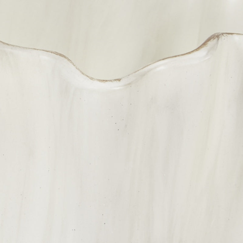 Cream wash bowl close-up of scalloped edge with faint gold accent
