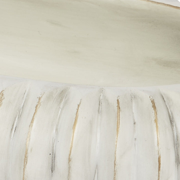 Cream oval bowl rim detail with carved grooves and subtle gold streaks