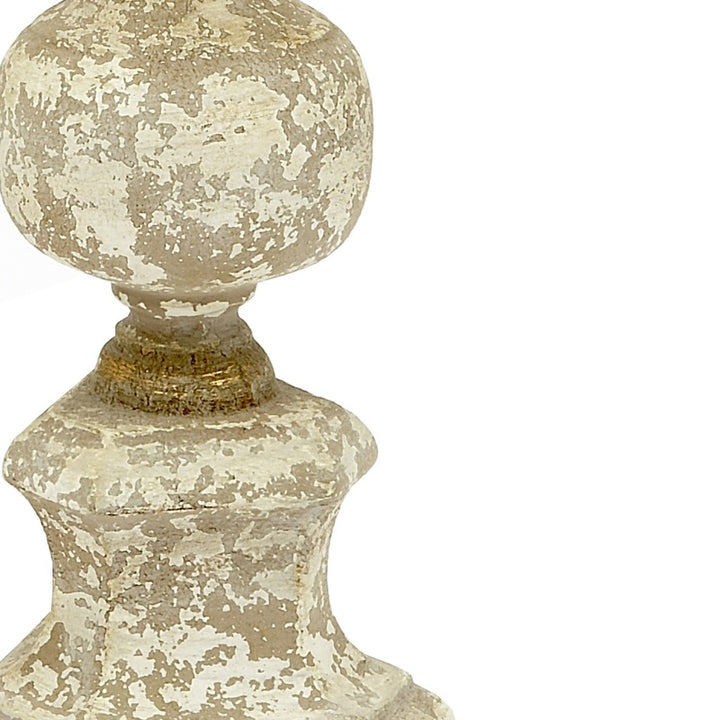 Gold-toned candle stick with textured speckled finish and flared pedestal