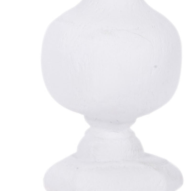 White gesso candle holder with rounded base, narrow neck, and bulb body