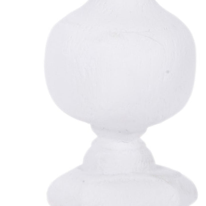 White gesso candle holder with rounded base, narrow neck, and bulb body