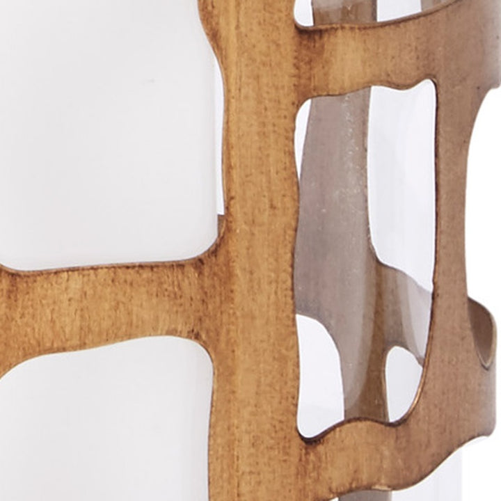 Gold-toned candle hurricane holder with geometric cutout windows