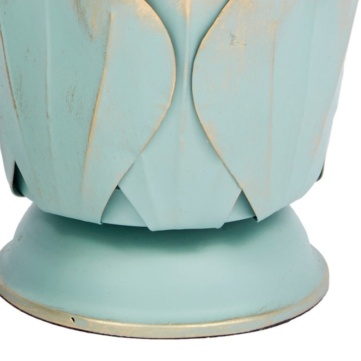 Set of 2 blue candleholders with petal-cut sides and round, gold-edged base