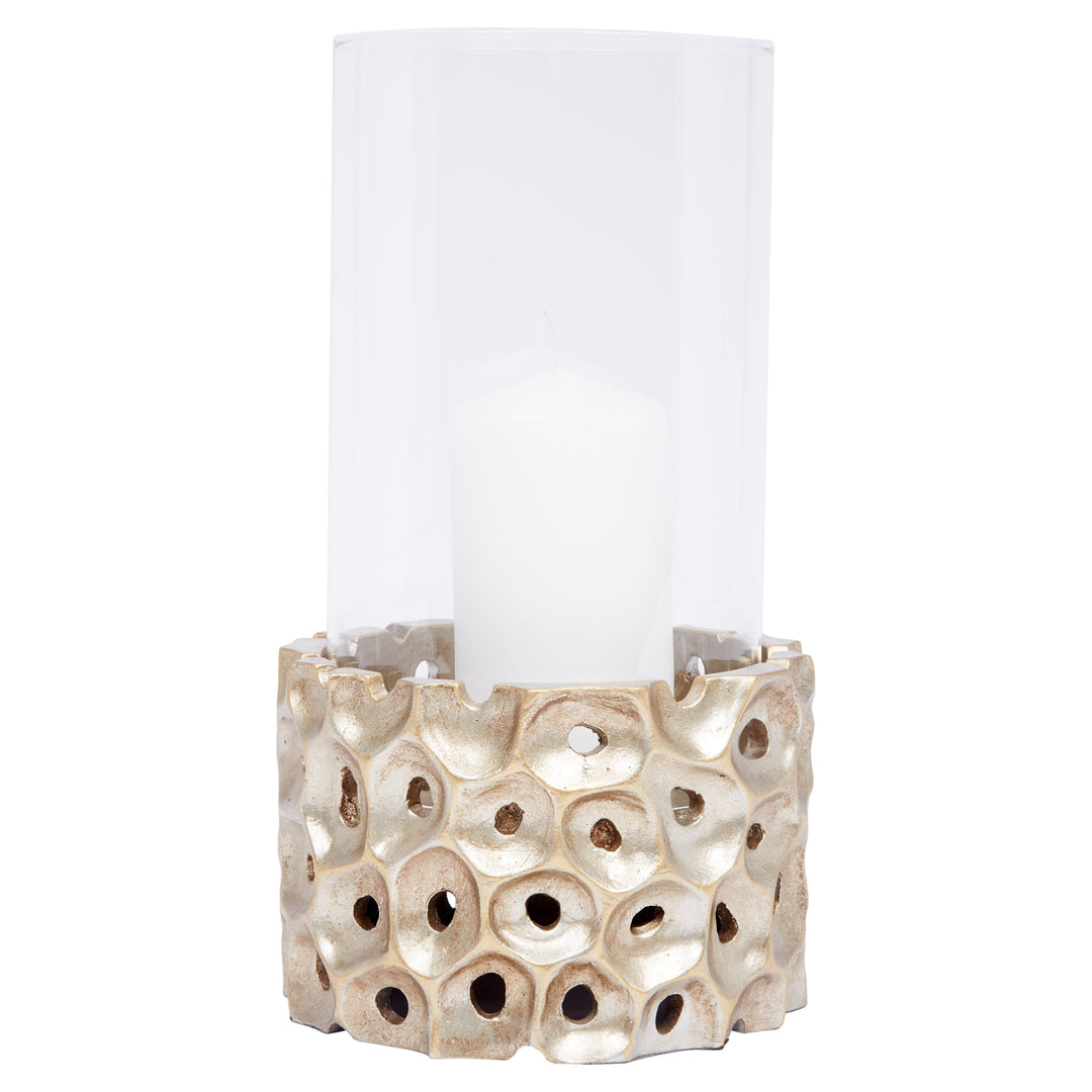 Elegant Brody candleholder in champagne gold, perfect for dining tables, mantels, or decorative displays.