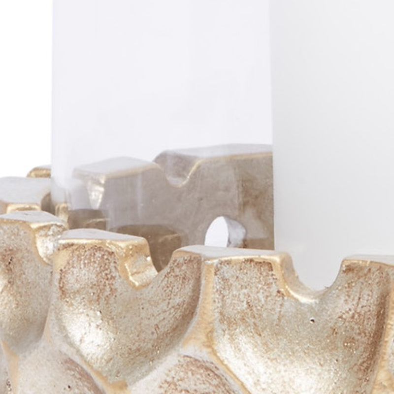 Champagne gold candle holder with scalloped rim and two open cup cutouts