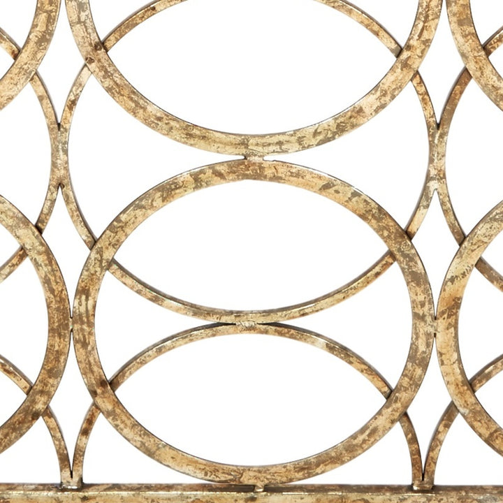 Geometric fireplace screen, gold oval and circle lattice design