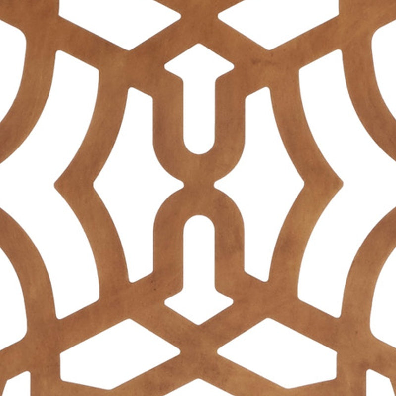 Decorative dark gold fireplace screen with geometric cutout pattern