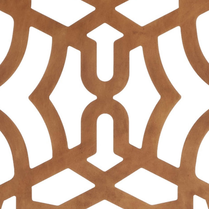 Decorative dark gold fireplace screen with geometric cutout pattern