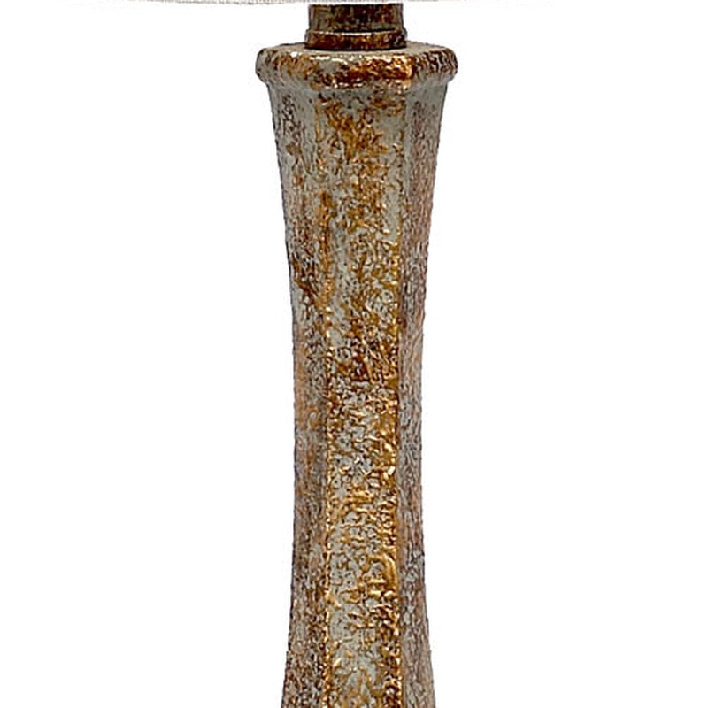 Aged gold lucite lamp base with textured mottled finish