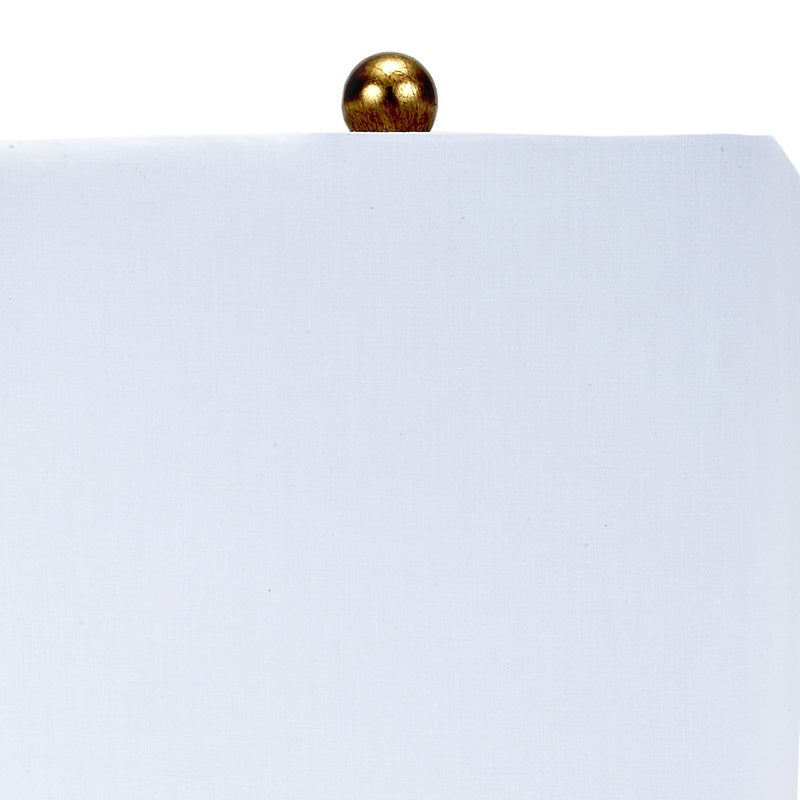 Square white lamp shade with gold finial on lucite base post