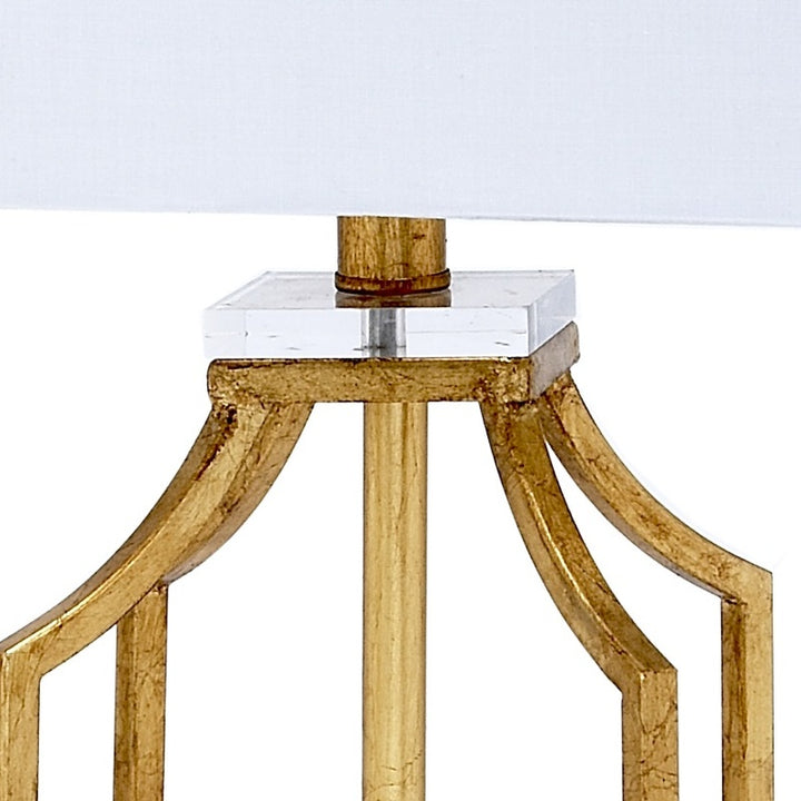 Gold-tone lamp frame with lucite top block under square white shade