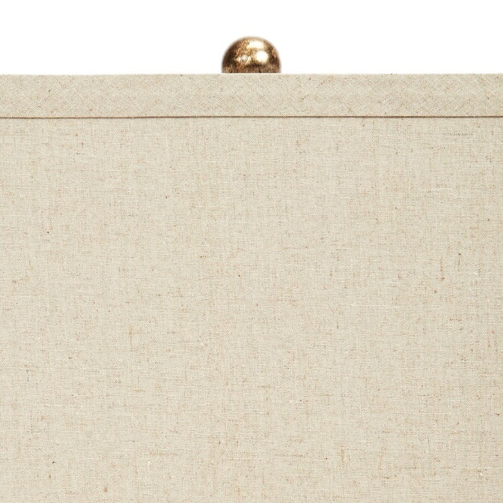 Square cement lamp with antique gold finial on top