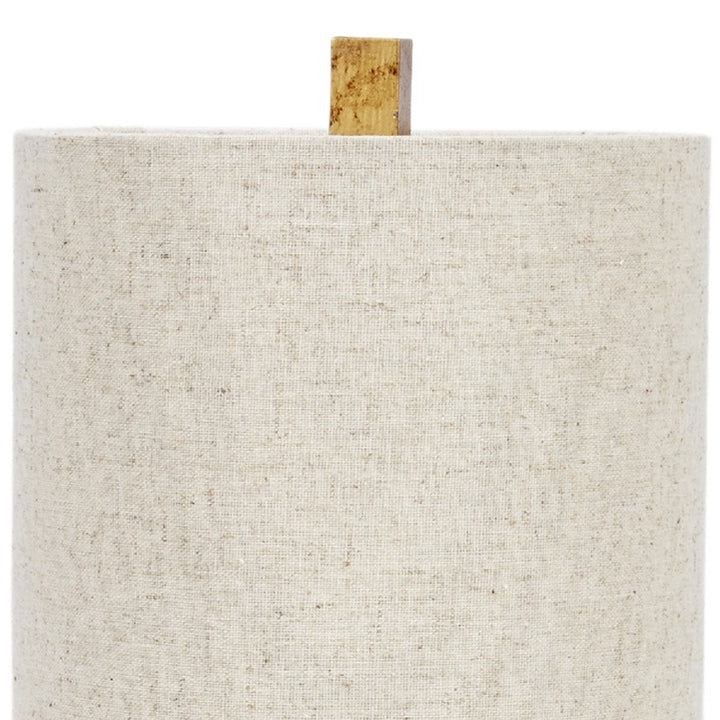 Fabric drum shade for table lamp, beige with visible gold stem