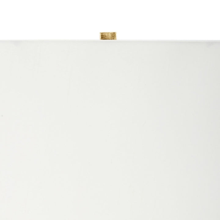 Gold leaf table lamp with cream shade and gold stem details