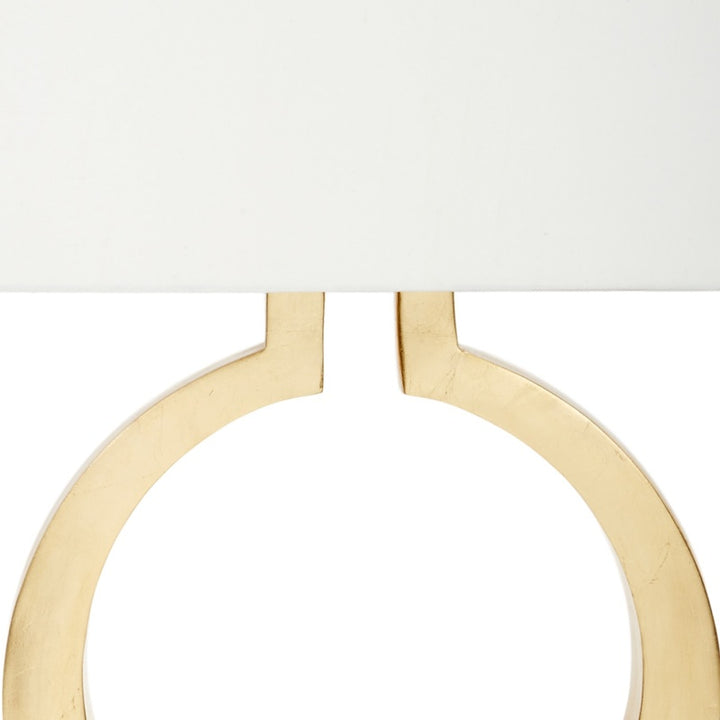 Gold leaf lamp frame and cream shade underside