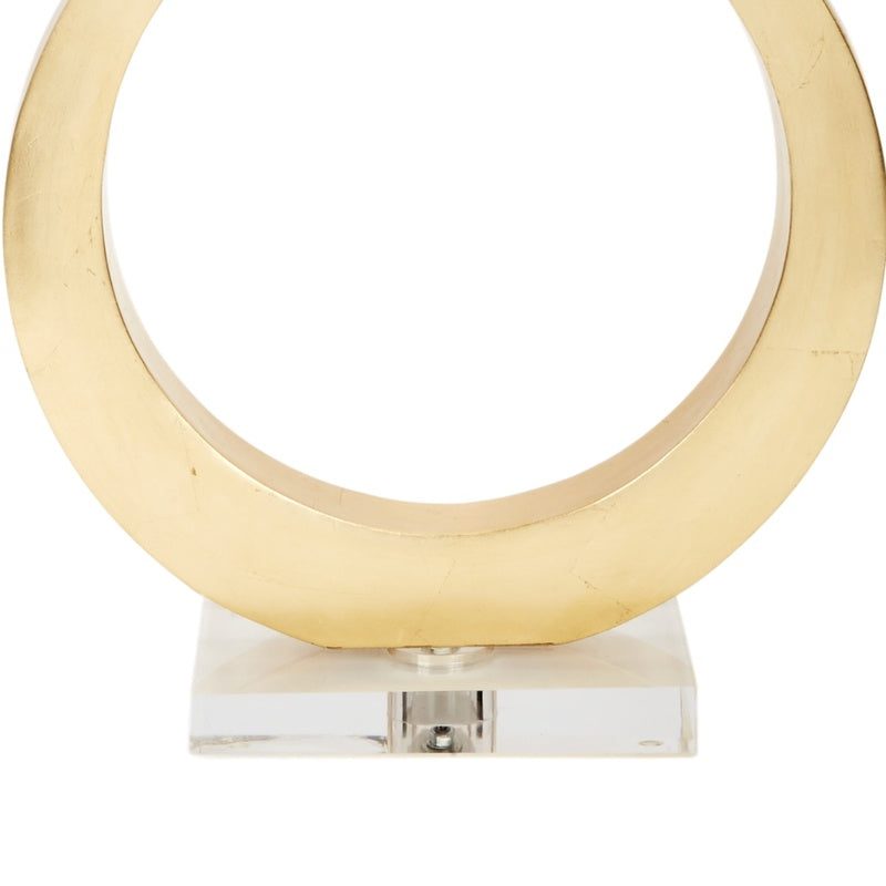 Gold leaf lamp with clear crystal base and circular gold ring