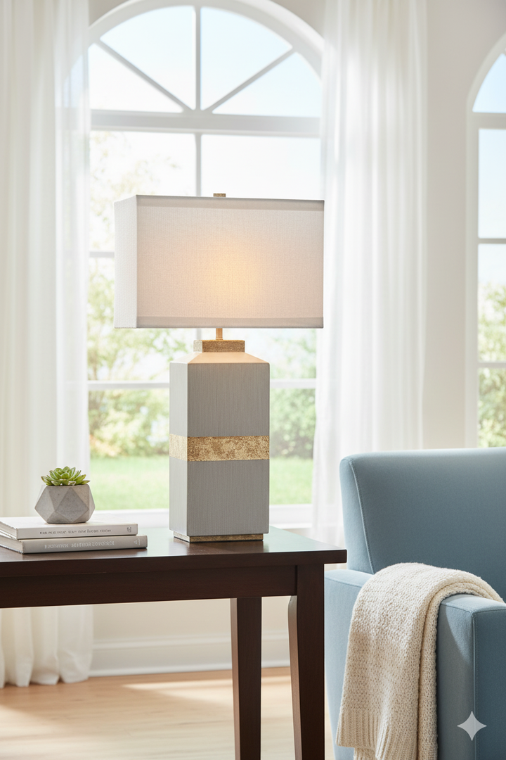 Equinox gold leaf lamp with a stunning crystal base and a creamy shade, bringing refined luxury and a gentle glow to your space.