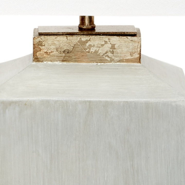 Cement table lamp with brass finial and champagne gold top cap