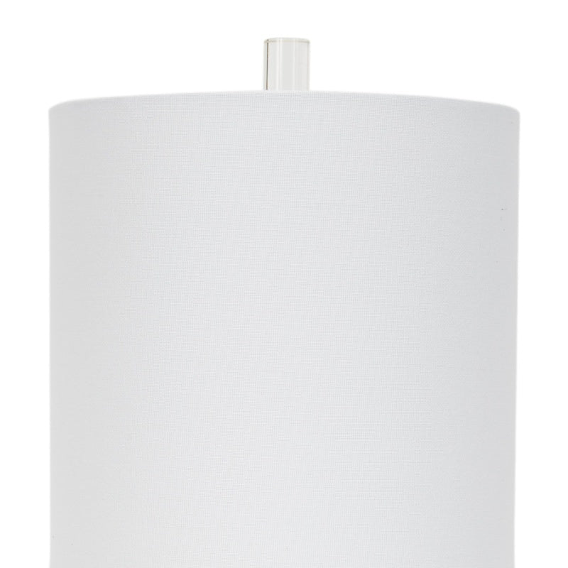 Table lamp with white fabric drum shade and clear crystal base, brass finish